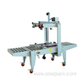 Carton Sealer with Top and Bottom Belt Drive